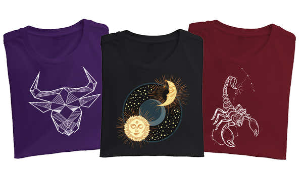 Three astrology-themed t-shirts; purple with a geometric bull, black with celestial sun and moon, and maroon with a zodiac scorpion design.