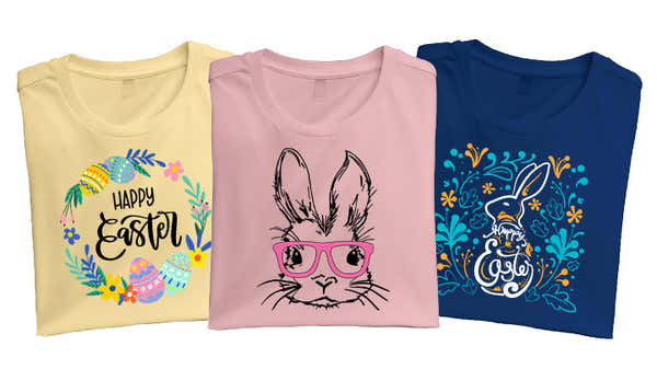 Three t-shirts laid out left to right with a yellow t-shirt with a HAPPY EASTER design, a pink t-shirt with a bunny with pink glasses and a navy blue t-shirt with a floral design, bunny and Easter in it. 