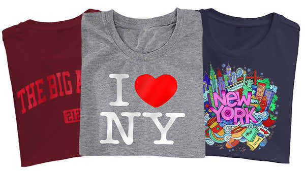 Banner featuring three New York City-themed t-shirts: maroon with 'THE BIG APPLE 212', grey with the classic 'I LOVE NY' design, and navy with a colorful, detailed New York City graphic.