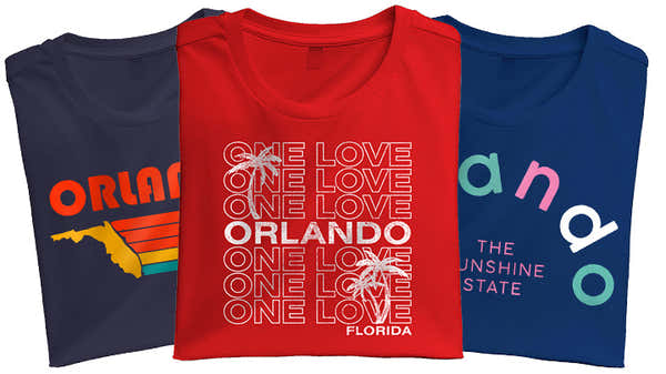 Banner showing three folded t-shirts with Orlando themes: one with rainbow stripes and Florida silhouette, one with 'ONE LOVE ORLANDO' text, and one with 'Orlando The Sunshine State' around a circle.