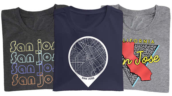 A display of three San Jose-themed t-shirts: charcoal with multicolored text, navy with a map pin overlaying a city grid, and grey featuring the California outline with 'San Jose' highlighted.