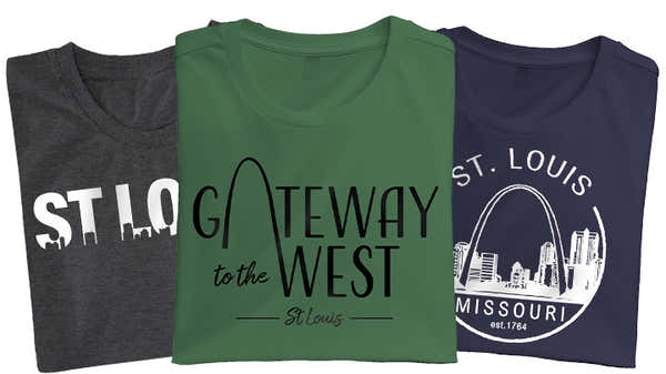 Banner showcasing three St. Louis-themed t-shirts: charcoal with 'ST LOUIS' and local icons, green with 'Gateway to the West' text over the Arch, and navy with a circle design of 'St. Louis Missouri' around a cityscape.